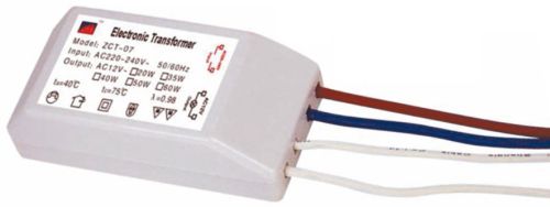 Понижающий трансформатор для галогенных ламп: 2 провода предназначены для сетевого напряжения 220 В, еще 2 — для выходящего напряжения 12 В